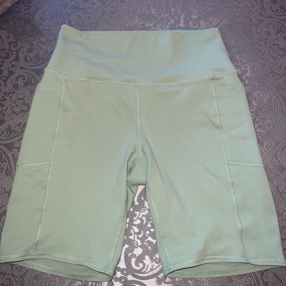Green biker shorts